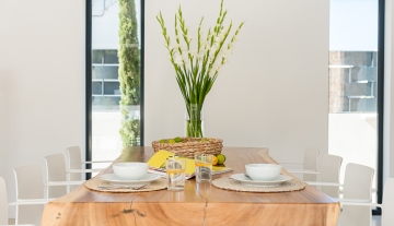 Resa estate modern villa for sale ibiza first line north diuning table detail.jpg